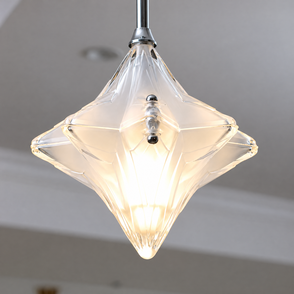 Vela Italian-Inspired Wall Sconce, Clear Sculptural Shade Wall Light with Silver-Tone Details for Bedroom & Entryway